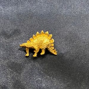 Vintage gold dinosaur pin